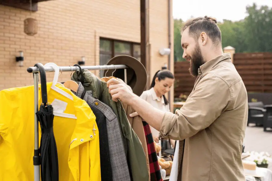 man shopping outside for clothes